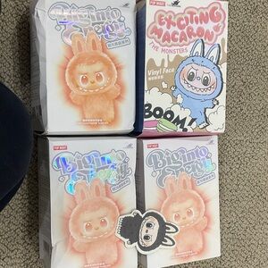 Pop Mart Vinyl Figures. Collectibles. Card fell out of one of these boxes.